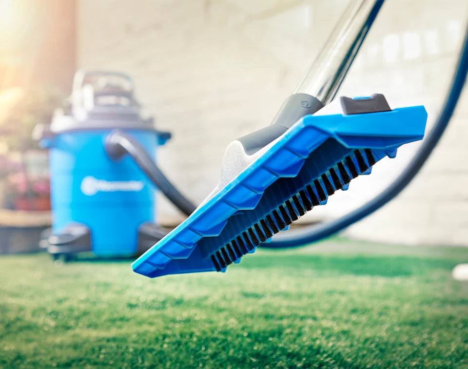 Artificial grass vacuum on uk lawn