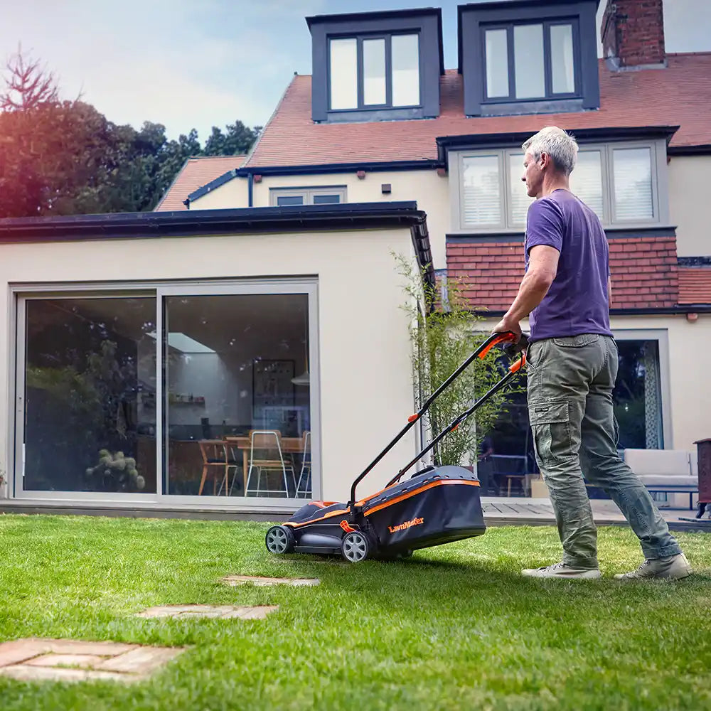 LawnMaster MX 24V 32cm Lawn Mower in an Irish Garden