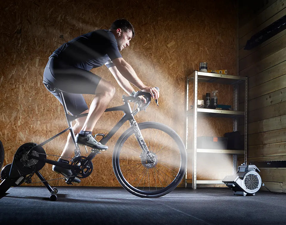 Vacmaster Cardio54 Fitness Fan blasting air on turbo trainer