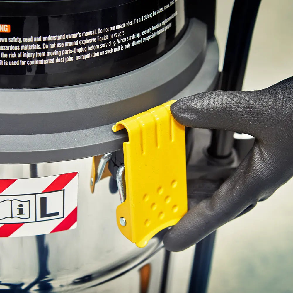 Vacmaster L Class Dust Extractor heavy duty steel tank clips being opened