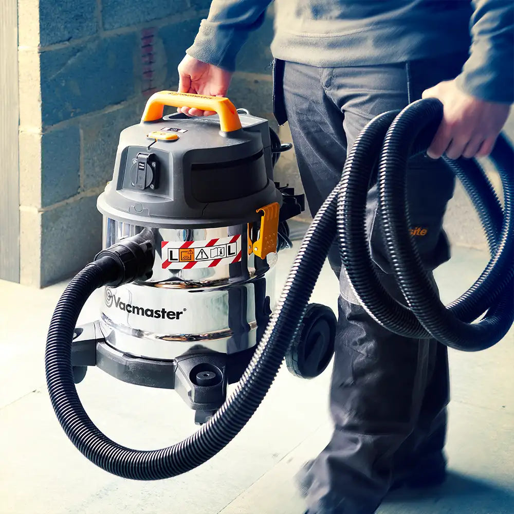 Vacmaster WD L20 Dust Extractor with Long Hose on building site