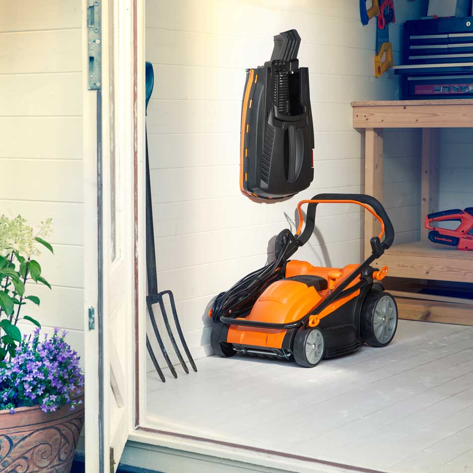 LawnMaster Lawn Mower Electric Rotary 37cm 1600W stored compactly in shed