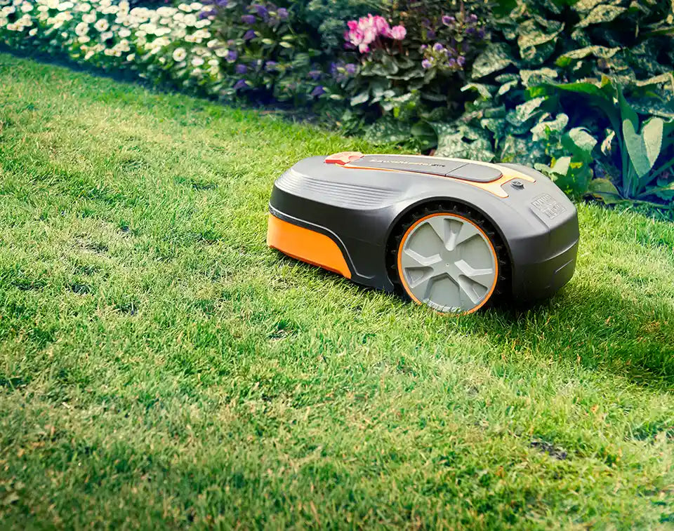 LawnMaster L10 Robot Lawn Mower in an irish Garden