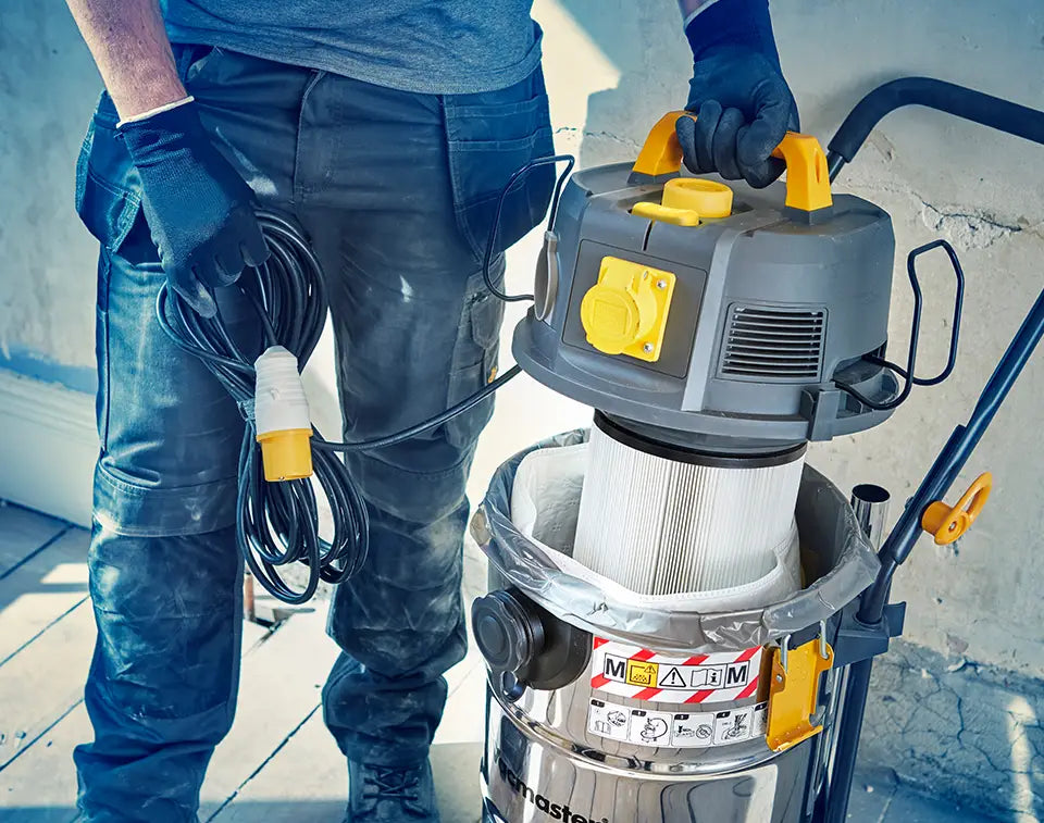 M Class Dust Extractor with a Bag and Filter inserted by Vacmaster