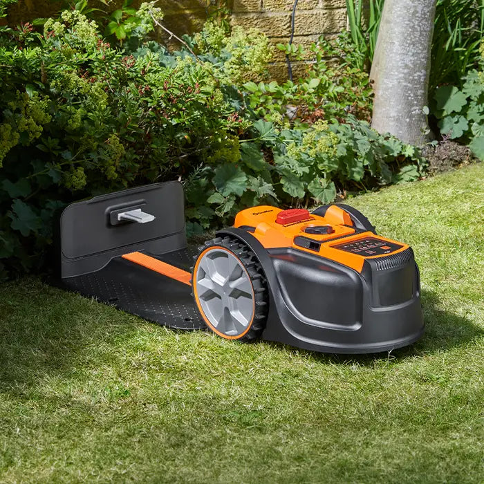 OcuMow AMB16-400 charging in an Irish garden