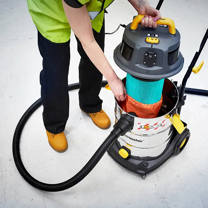 Vacmaster dust extractor vacuum cleaner's dual HEPA filters being revealed