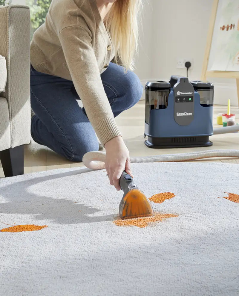 EasyClean Carpet Spot Cleaner with long reach hose cleaning paint from rug 
