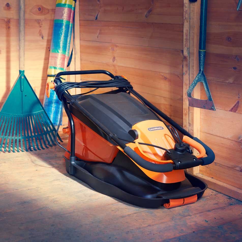 LawnMaster Hover Collect Mower 36cm 1800W stored compactly in shed