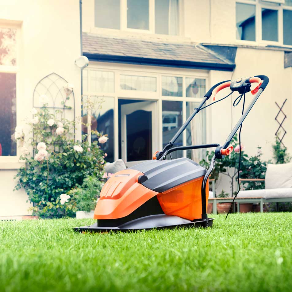 LawnMaster Hover Collect Mower 36cm 1800W on lawn in Irish Garden