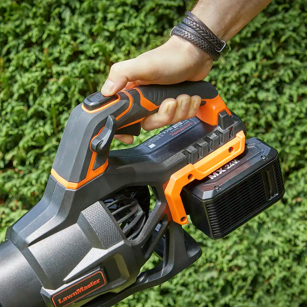 Finger on turbo button of 48V LawnMaster Axial leaf blower