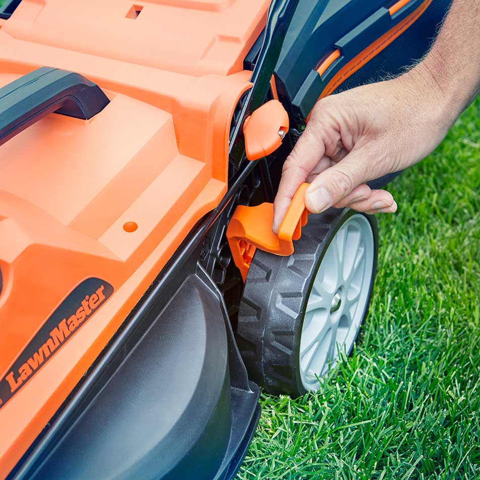 LawnMaster Cordless Lawnmower for small to medium sized gardens has mow height adjust 