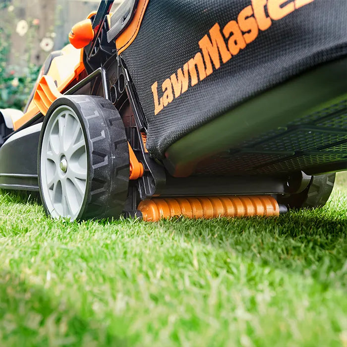 LawnMaster Cordless 34cm Lawn Mower in an Irish Garden