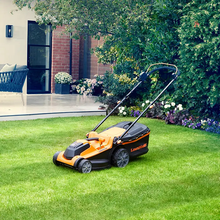 LawnMaster 37cm Cordless Lawn Mower in an Irish Garden