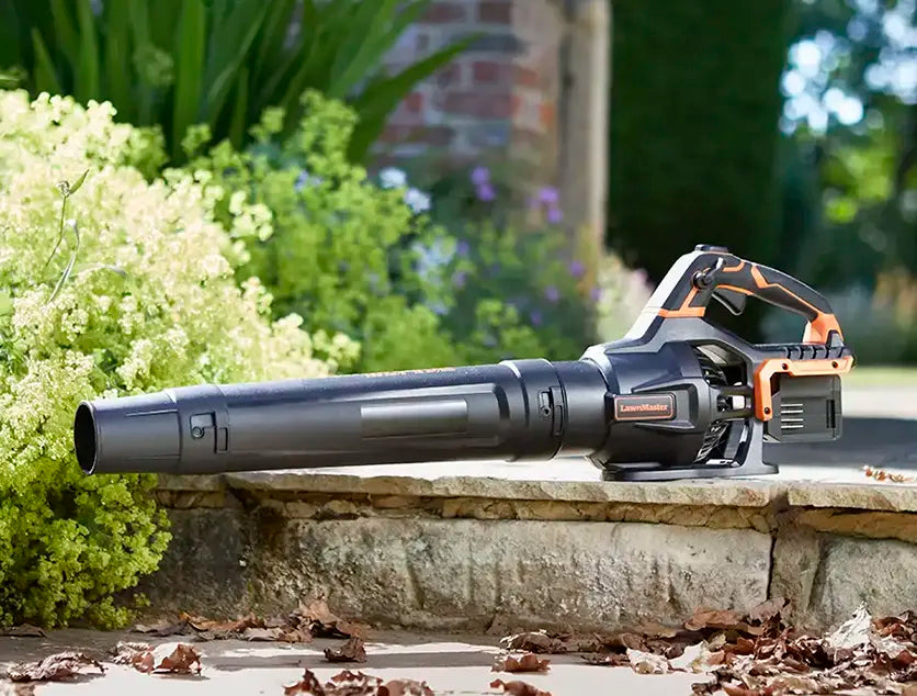 LawnMaster 48V Axial leaf blower on garden path without batteries