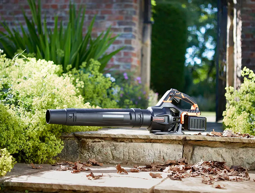 LawnMaster 48V Axial leaf blower on garden path