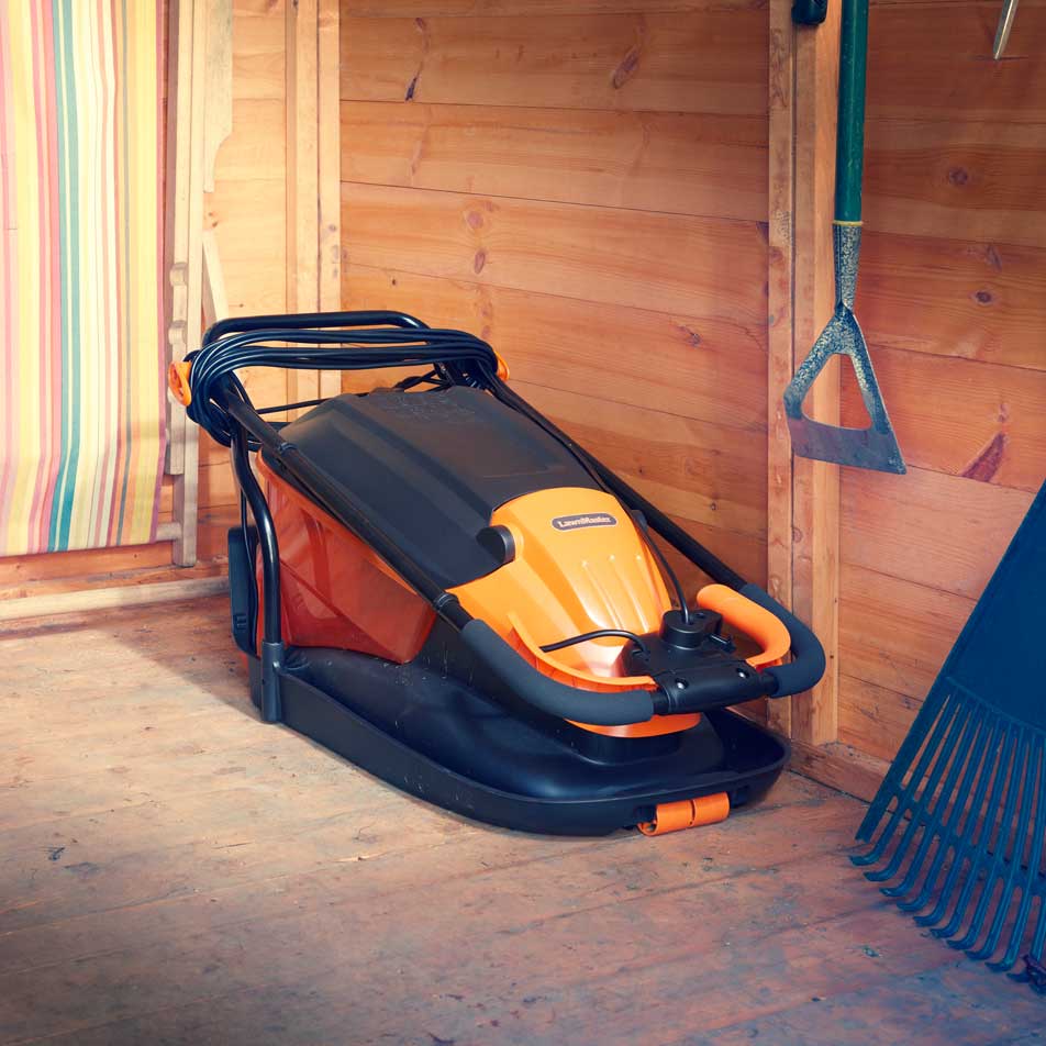 LawnMaster Hover Collect Lawn Mower 1500W 33cm MEH1533 Folded away in shed