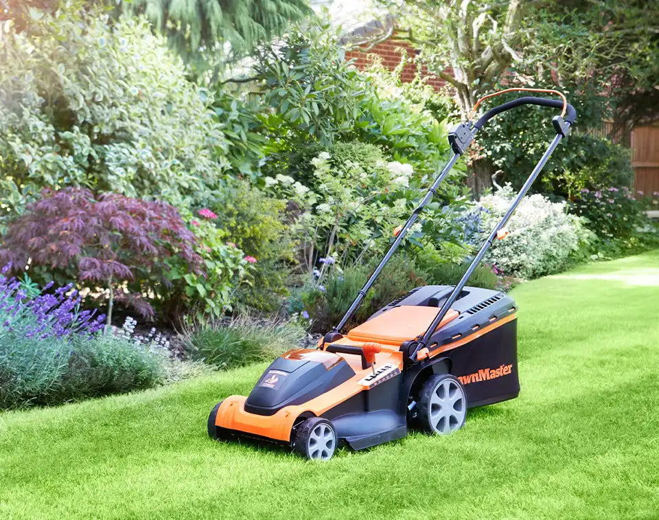 LawnMaster cordless Lawnmower on lawn in ireland