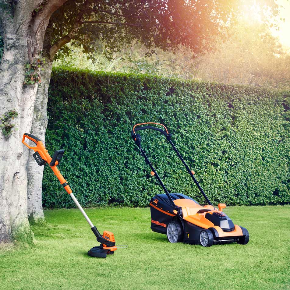 LawnMaster 24V Cordless Lawnmower and Grass trimmer in large garden