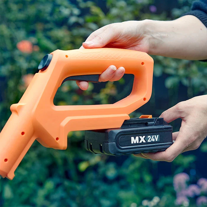 MX 24V 2.0ah Battery in a LawnMaster Grass Trimmer