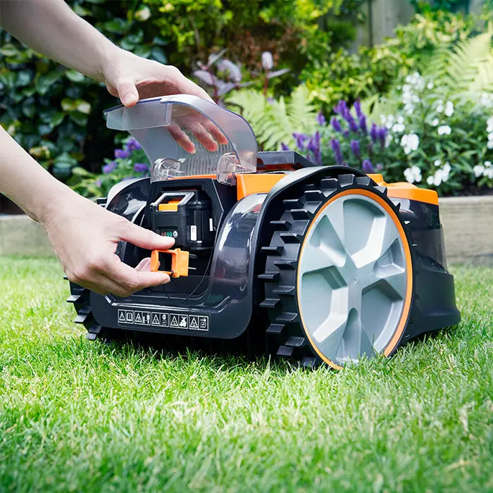 LawnMster OcuMow Vbrm16 Robot Mower safety key being inserted
