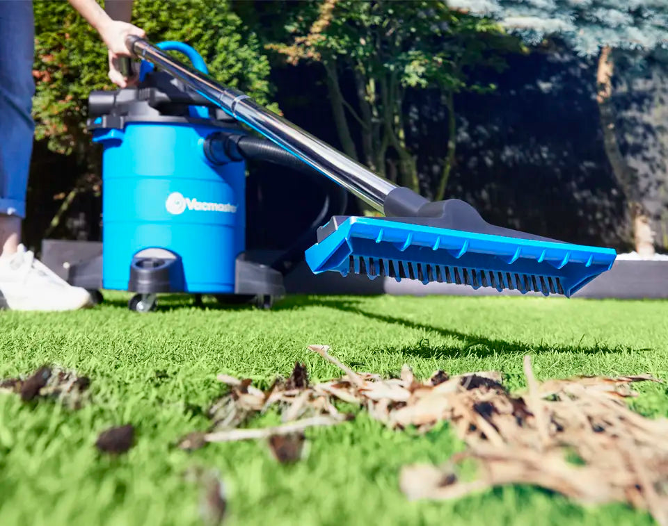 Artificial Grass outdoor vacuum cleaner nozzle on astroturf lawn