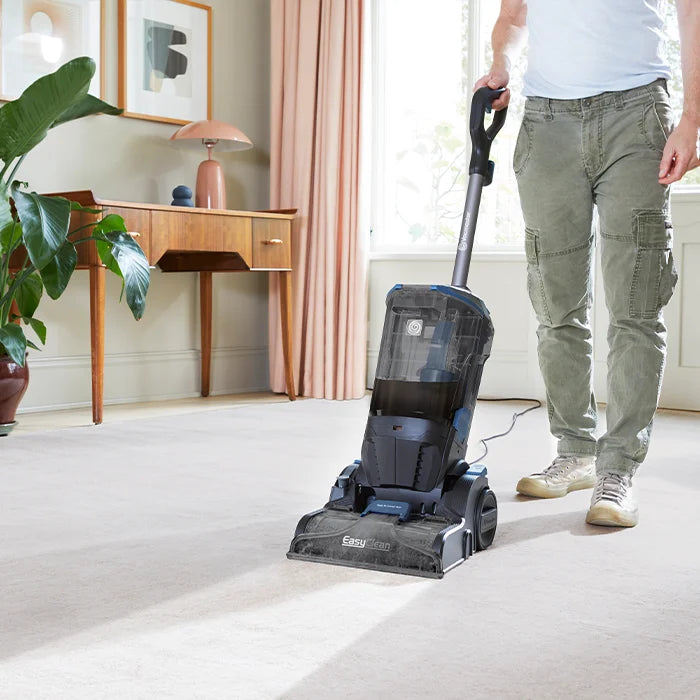 Vacmaster UCM upright cleaner deep cleaning carpet in living room