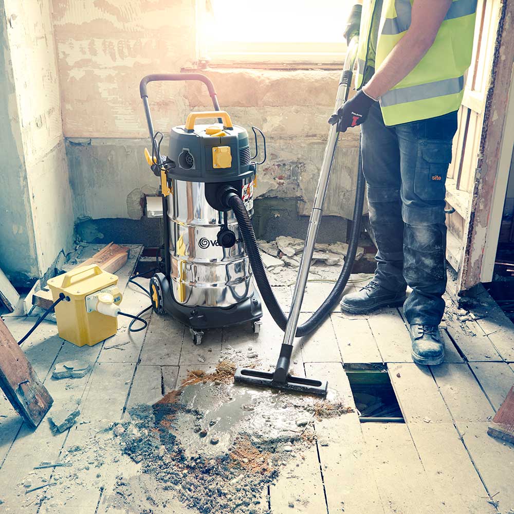 Vacmaster M38 M Class Wet and Dust Extractor collecting cement and grit