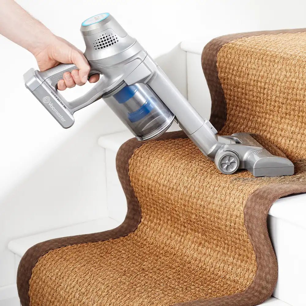 Vacmaster Cordless Vacuum in use on stairs of Irish home