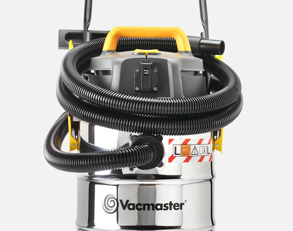Vacmaster anti-crush vacuum cleaner suction hose wrapped around machine